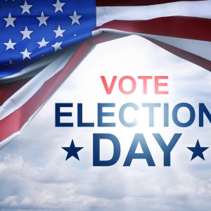 American flag with the words "Vote Election Day" under it